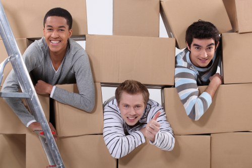 Van and crew preparing for a house move under service terms