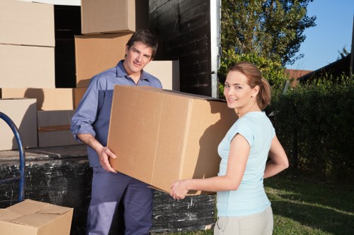 Loading household items into a moving van